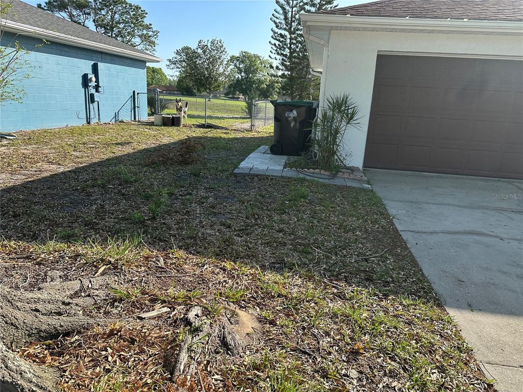 Photo of 12643 Idaho Woods Lane, Orlando, FL 32824 (MLS # O6396326)