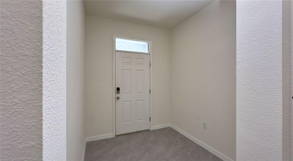 Photo of 1570 Hubbell Road, Wesley Chapel, FL 33543 (MLS # O6380871)