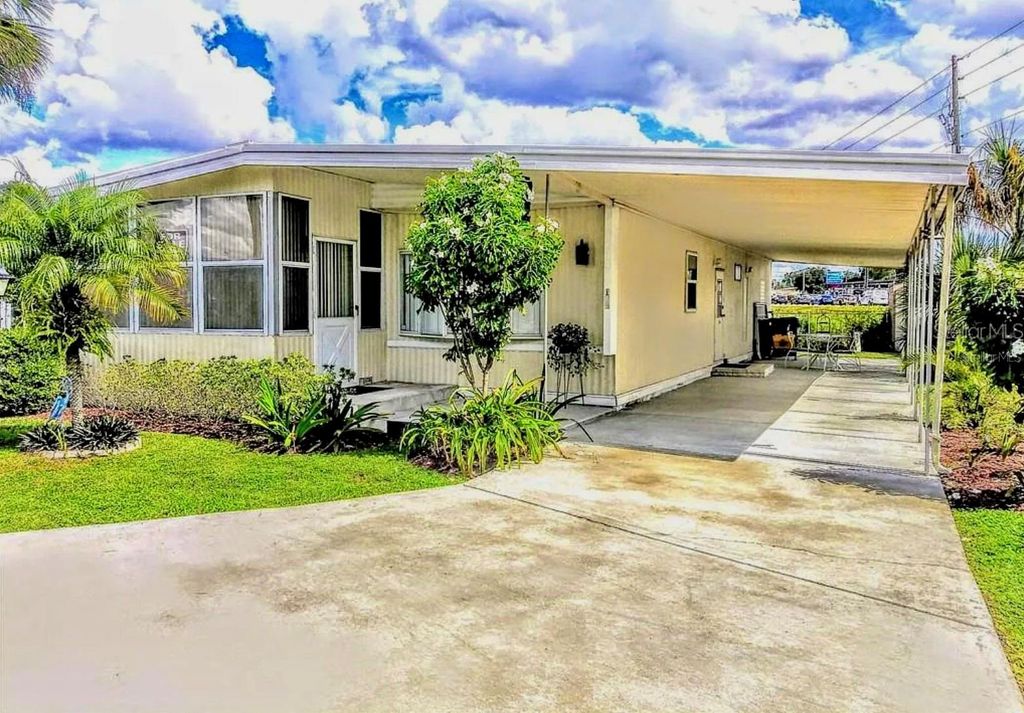 Photo of 100 Lakeside Ranch Drive, Winter Haven, FL 33881 (MLS # O6303367)