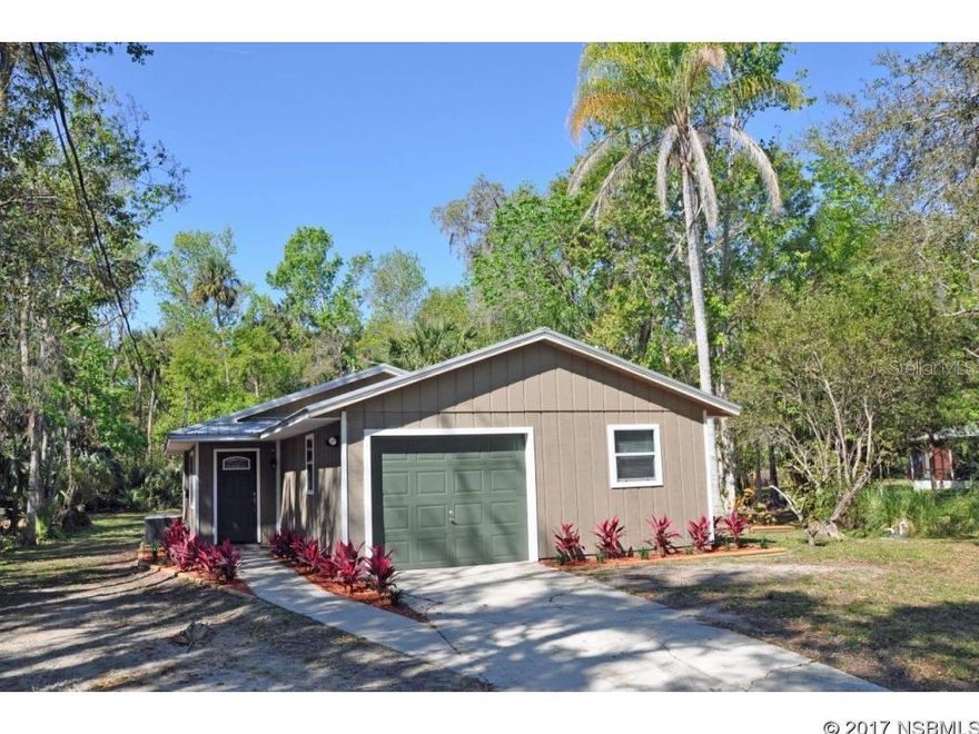 Renovated home with pole barn on almost 1/2 an acre near town.    Tiled throughout, this 2 bdrm 1.5 bath home with garage, has been nicely remodeled including double-paned Low E windows/sliders & siding/paint in 2016 & HVAC in 2013.  The 31x29 pole barn is great for extra cars, boats, RVs & other toys.   Metal roof 2003. Drainfield 2007, water heater 2014.  Ideal for first-time home buyers or income/investment.    Move-in condition.  See to appreciate. ;Water: City