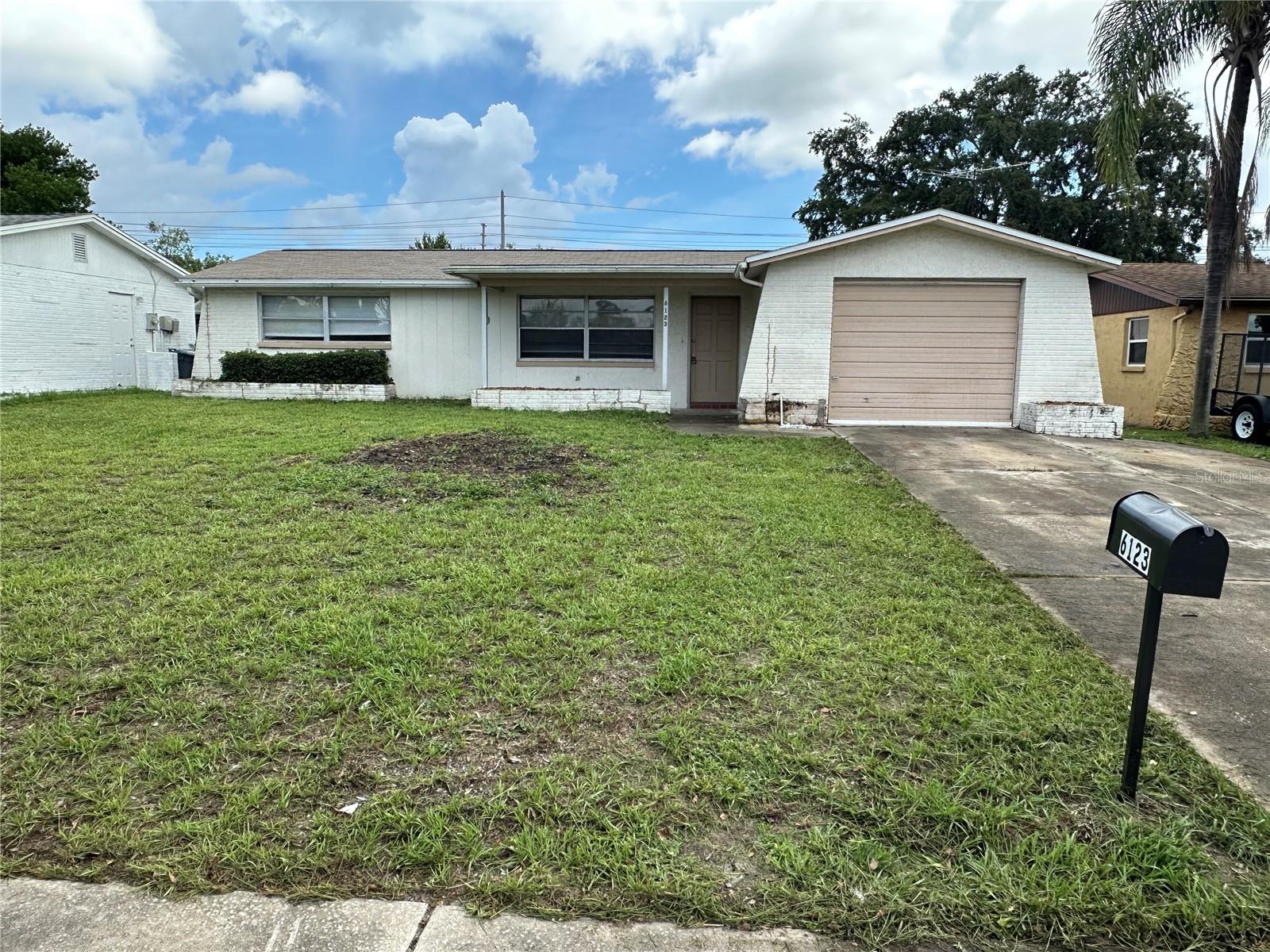 This spacious two bedroom, two bathroom home in New Port Richey is just east of Madison. Home is newly painted with new luxury vinyl flooring in the main living areas and tile throughout the bedrooms and bathrooms. Interior has all new doors, ac vents, light switches, outlets and face plates. Home Features a living room /dining room combo and a large family room. Home has a screened lanai and one car garage. Pets allowed some breed restrictions.