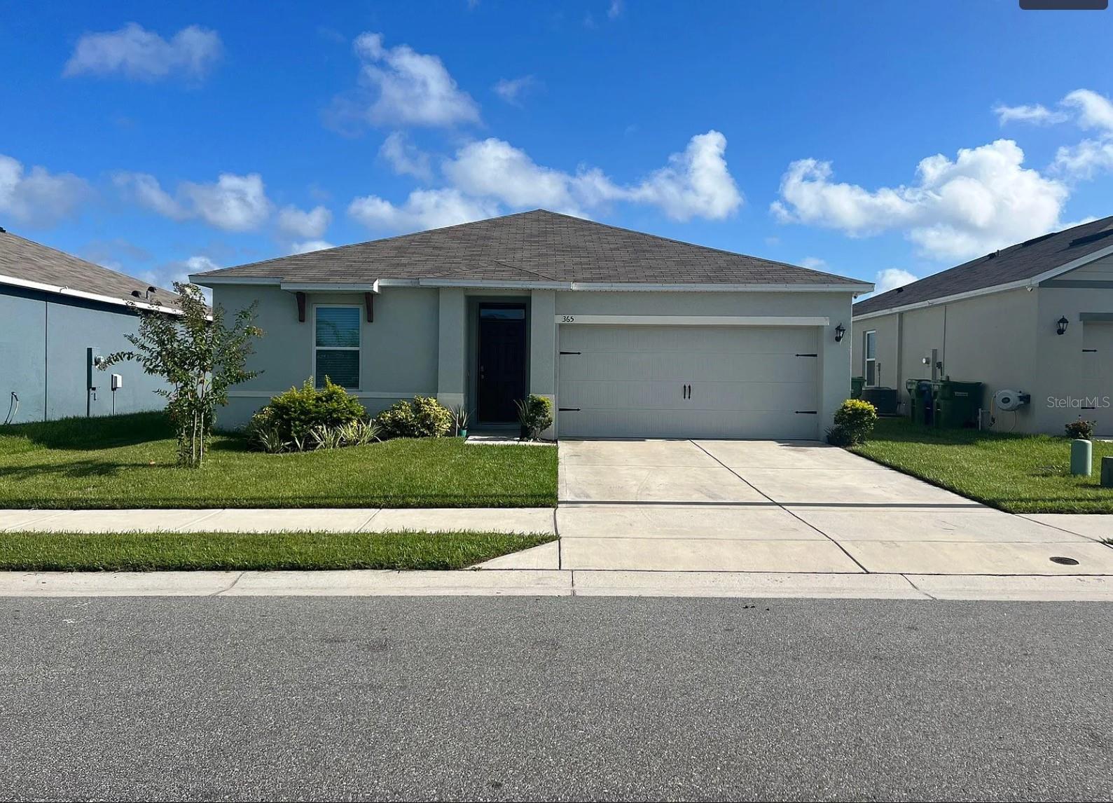 Don’t miss out on this beautiful 4-bedroom, 2-bath home built in January 2021!Featuring a spacious and well-designed layout, this home offers everything a family needs.From the moment you arrive, you'll notice the inviting curb appeal and the wide concrete driveway leading to a generously sized garage. Inside, enjoy the modern open floor plan with tile flooring throughout the main living areas, including the primary bedroom, while the other three bedrooms feature brand new carpet for added comfort.The kitchen is fully equipped with stainless steel appliances,and a large kitchen countertop perfect for any home chef. It opens to a bright and spacious living and dining area, ideal for entertaining.The primary suite features tile flooring, a walk-in closet, and an en-suite bathroom. The other three bedrooms share a well-appointed second bathroom.Enjoy Florida living with a large backyard, great for relaxing or spending time outdoors. Conveniently located near shops, restaurants, and entertainment, with easy access to major highways, theme parks like Legoland and Peppa Pig Park, and just under 1.5 hours from Clearwater and Melbourne beaches.Available for move-in October 1st – act fast!All appliances are included.Currently tenant-occupied. Schedule your tour today before it’s gone!