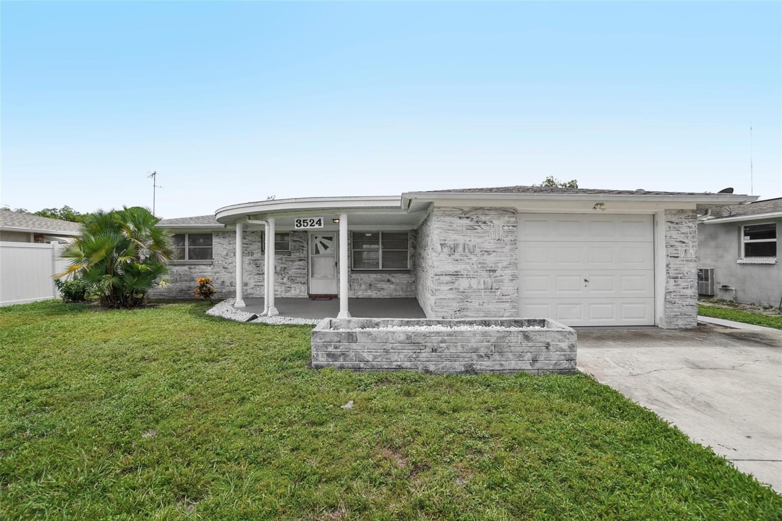 This charming 3-bedroom, 2-bath residence offers modern updates and comfortable living in a convenient setting. The home features a stylish remodeled interior, a bright and open layout, and a 1-car garage for secure parking and storage. The kitchen is equipped with stainless steel appliances, adding a sleek touch to your cooking space. Enjoy the spacious covered back porch and patio—perfect for relaxing or entertaining.