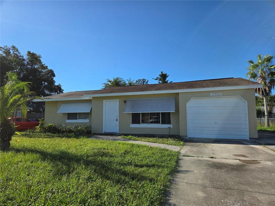 Welcome to S. Biscayne & Tamiami Tr -2 bedroom, a charming home nestled in the vibrant community of North Port, FL. This delightful 2-bedroom, 1-bathroom home boasts a fresh interior and exterior paint job, new tile floors throughout, and a 3-year-old roof. The large dine-in kitchen, equipped with modern amenities and a pass-through to the sunroom, is perfect for entertaining. The spacious bedrooms, including a large master with a walk-in closet and semi-ensuite bath, offer ample space for relaxation. The bathroom is modern and well-appointed with double sinks, vanities, and a shower/tub combo. The home also features a large living room adjacent to the kitchen, a sliding door walk-out to the sunroom, and an attached single-car garage. The sunroom opens to a large rear patio and a generously sized, fenced, south-facing yard, providing plenty of outdoor space for enjoyment. This home is a perfect blend of comfort and modern living.