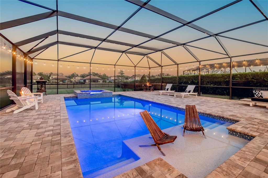 Photo of 10304 Meadowrun Drive, Lithia, FL 33547 (MLS # TB8466349)