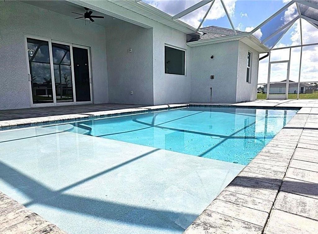 Photo of 4338 NW 31st Terrace, Cape Coral, FL 33993 (MLS # C7526427)