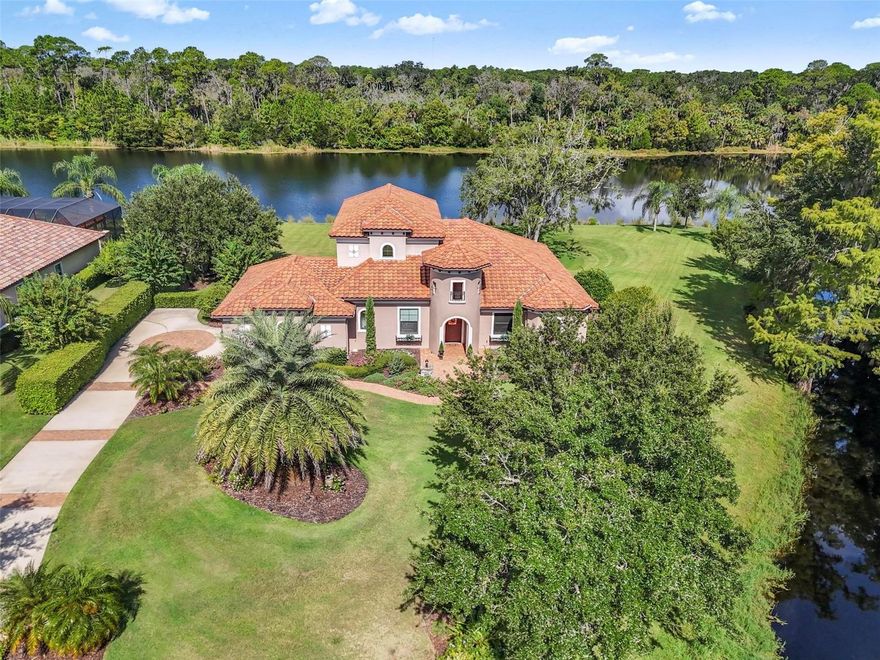 Exquisite custom Skyway Built waterfront home located on a premium lot in the gated Wild Oaks at Grand Haven! This 3BR + office home offers soaring ceilings, an open living area, wet bar, and a luxury master suite. Upstairs features spacious guest rooms and a balcony with stunning lake and preserve views. The oversized screened lanai includes a saltwater spa, pavers, and exceptional privacy. Recent upgrades include a new 3-zone AC, extended garage, solid-core doors, and more. Residents enjoy Grand Haven’s resort-style amenities: golf, dining, fitness, pickleball, tennis, and pools.