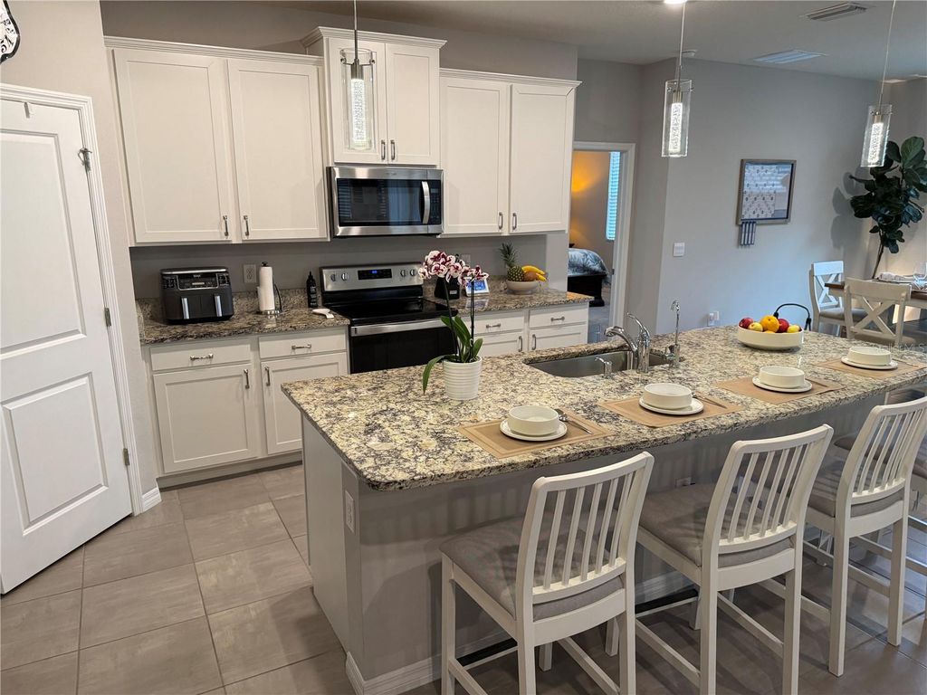 Photo of 10437 Laxer Cay Loop, San Antonio, FL 33576 (MLS # TB8469566)