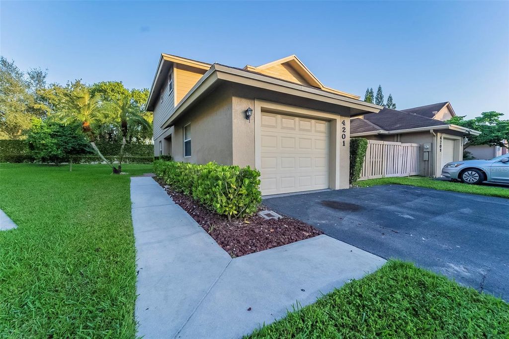 Photo of 4201 NW 120th Lane, Sunrise, FL 33323 (MLS # O6351385)