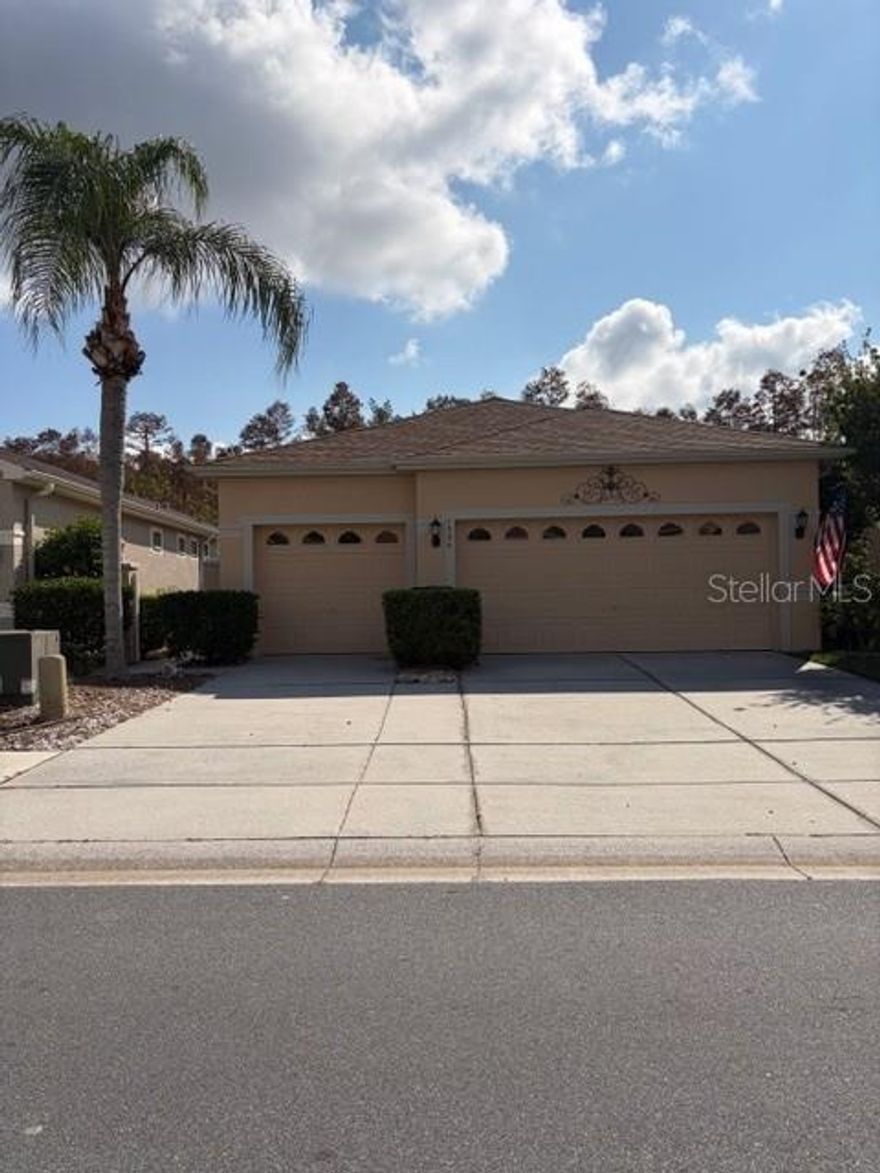 This 3 bedroom 2 bath home located in the 55+ community of The Groves Golf and Country Club features a 3 car garage (rare in this community), eat-in kitchen with island, split plan and screened in lanai.  The Groves features a host of amenities including a golf course, tennis courts, bocce and swimming pool. the Community features guarded gate, clubhouse with active social club and on-site restaurant/bar.  Close to shopping (can take the golf cart to the plaza just outside the community), restaurants and easy access to both I75 and Veteran's Expressway.