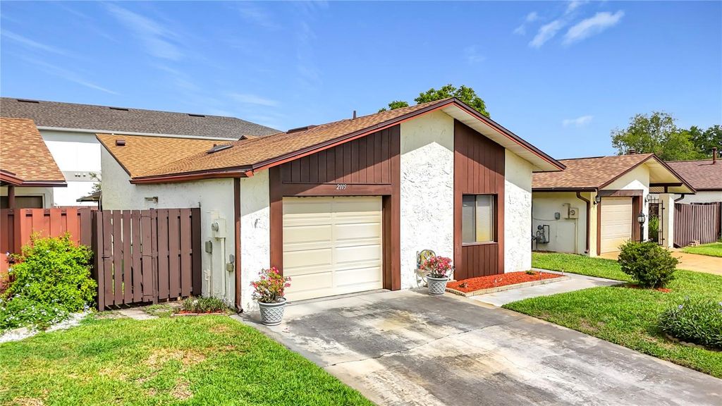 Photo of 2115 Kings Crossing SW, Winter Haven, FL 33880 (MLS # L4962289)
