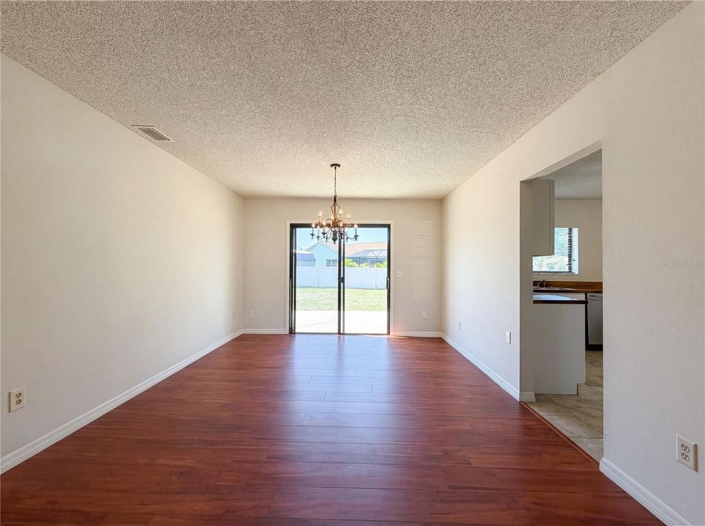 Photo of 3993 Suburban Lane, North Port, FL 34287 (MLS # O6396030)