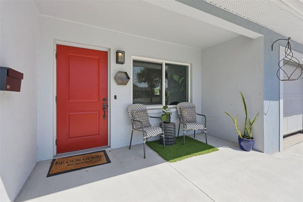 Photo of 9571 Sun Isle Drive NE, St Petersburg, FL 33702 (MLS # TB8487447)