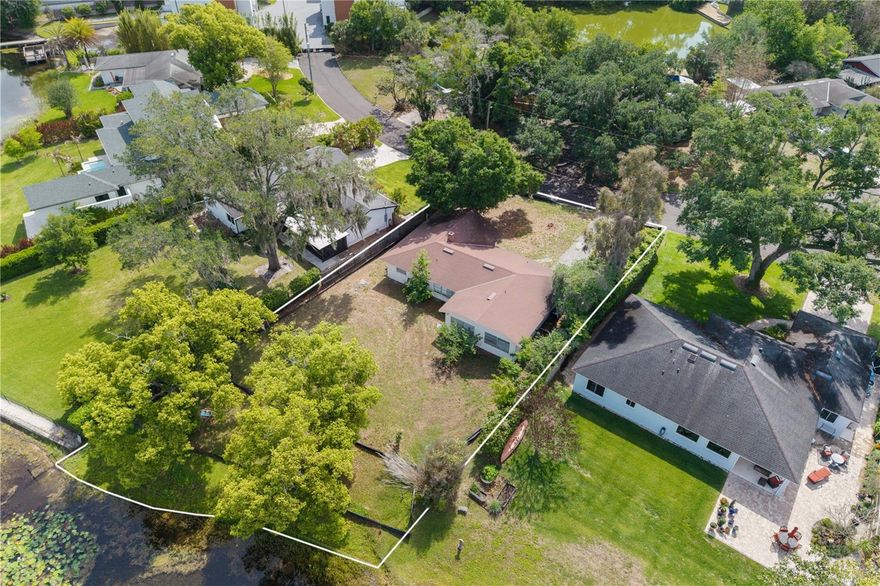 Lakefront home on over 1 acre in Winter Park with approximately 95 feet of frontage on Lake Spier.
Positioned on a private, spring-fed lake, this property presents a rare opportunity to build a brand-new luxury residence or thoughtfully renovate the existing home into a refined lakefront retreat. The expansive lot widens toward the water, creating an exceptional setting for outdoor living, privacy, and long-term value.
Located in one of Winter Park’s most established areas, just minutes from Park Avenue, top-rated schools, and everyday conveniences, this is a unique canvas for those looking to create something truly special.
No HOA. No CDD.