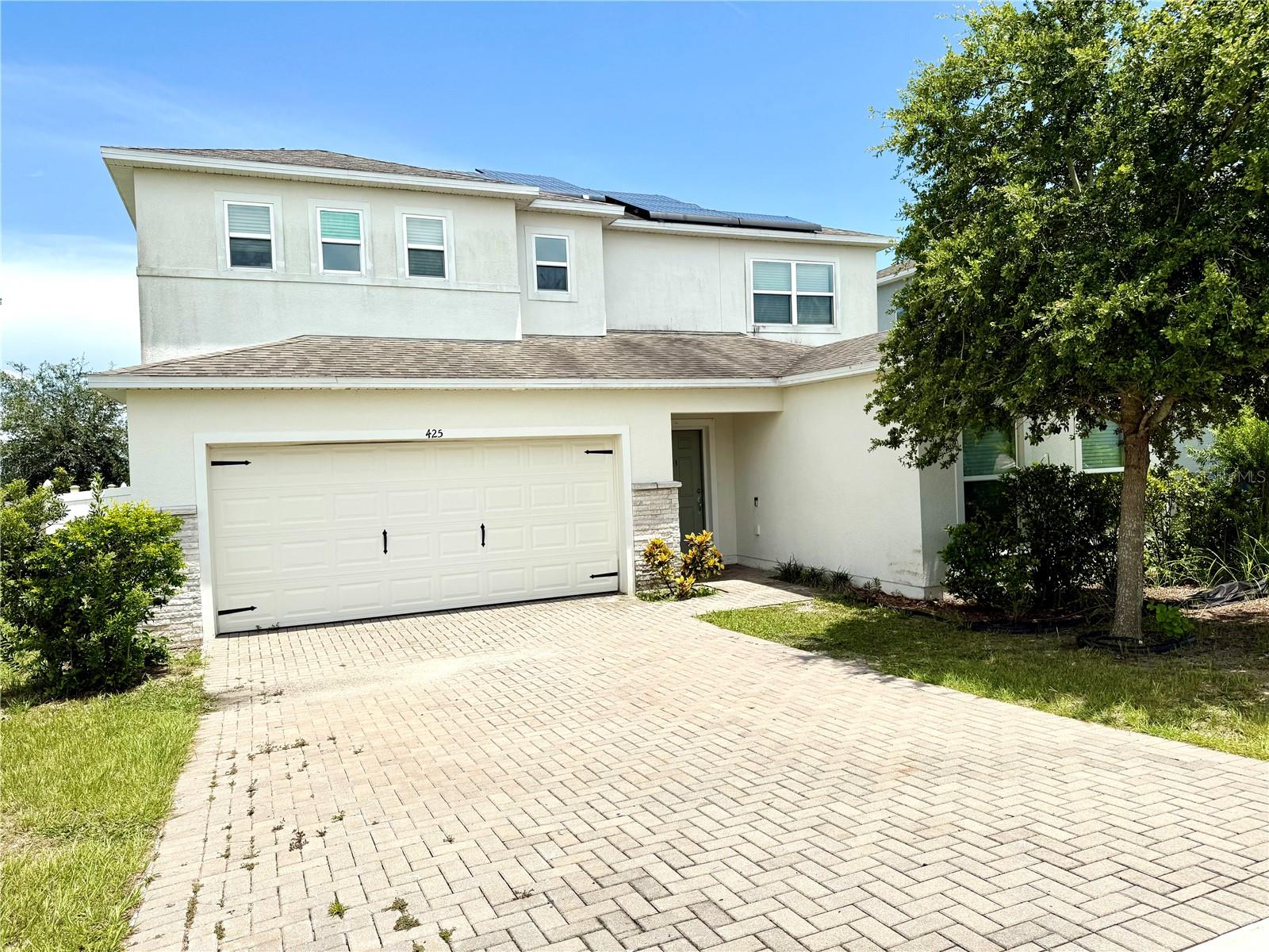 Welcome to this spacious 5-bedroom, 4.5-bath home located in the sought-after Eagle Pointe community of Groveland. Built in 2019, this nearly 3,000 sq ft home offers plenty of room for family, guests, and entertaining — and with a little TLC, it’s ready to truly shine! Step inside to an open-concept floor plan filled with natural light. The generous living and dining areas flow into a large kitchen featuring stainless steel appliances, a breakfast nook, and abundant counter space. The first floor also offers a dedicated study/den and a guest bedroom with access to a full bath, perfect for visitors or multigenerational living. Upstairs, you’ll find a versatile loft, four additional bedrooms including the spacious primary suite with spa-like ensuite bath, and a convenient upstairs laundry room. Enjoy outdoor living on the screened rear lanai overlooking a fully fenced backyard, ideal for weekend barbecues or relaxing under the Florida sun. Outdoor enthusiasts will love the direct access to the South Lake Trail, which connects to the West Orange Trail — perfect for walking, biking, and running right from your doorstep! Located just minutes from historic downtown Clermont and Orlando’s top attractions, this home offers both tranquility and connectivity. Don’t miss your chance to make this spacious, well-located home your own. Schedule your private showing today!
