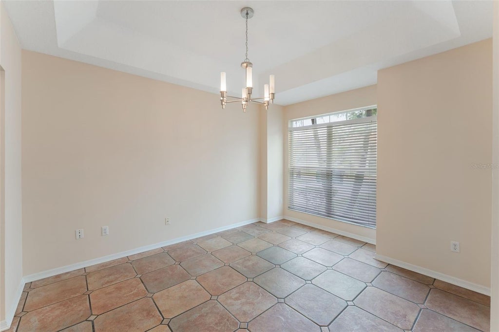 Photo of 3845 Gatlin Place Circle, Orlando, FL 32812 (MLS # O6448461)