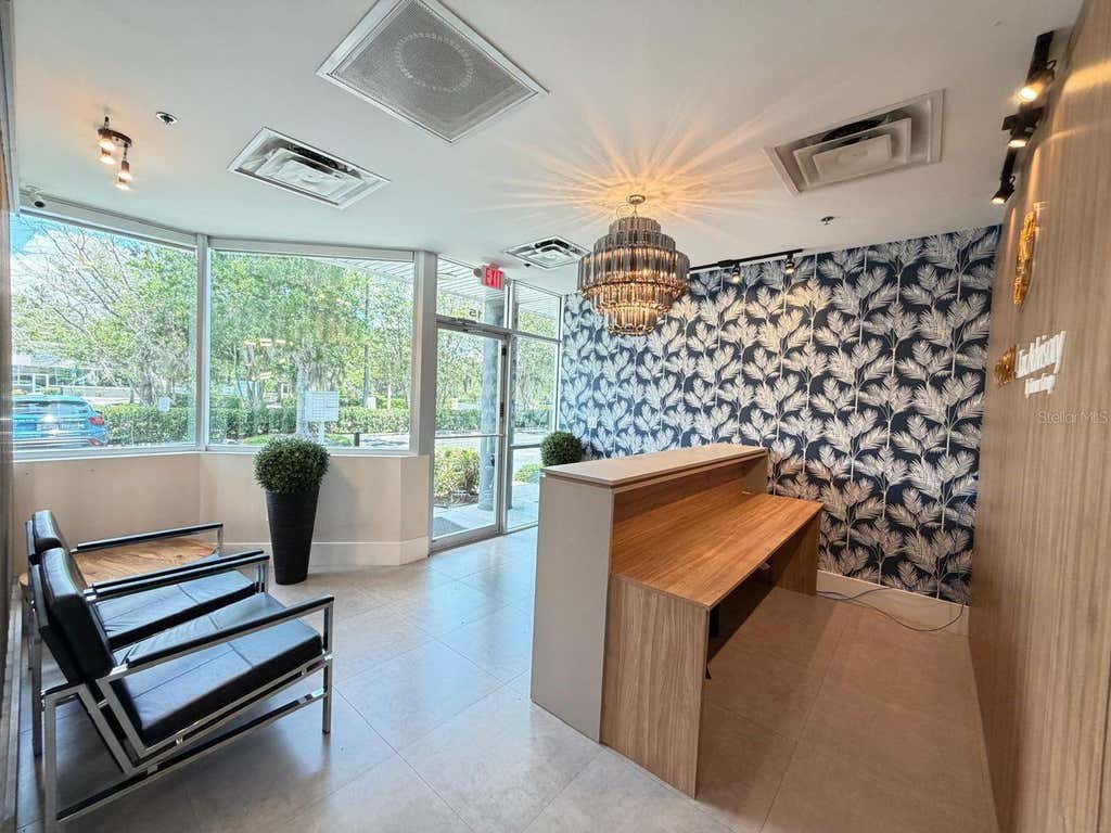 Photo of 7901 Kingspointe Parkway #15, Orlando, FL 32819 (MLS # O6433319)