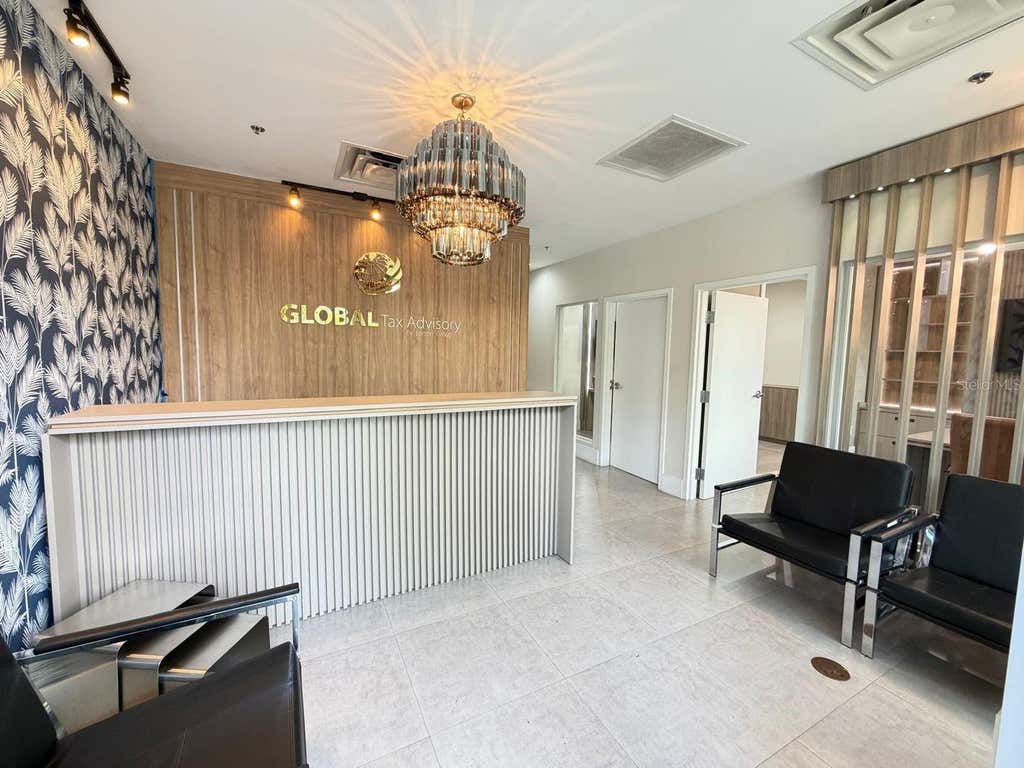 Photo of 7901 Kingspointe Parkway #15, Orlando, FL 32819 (MLS # O6433319)