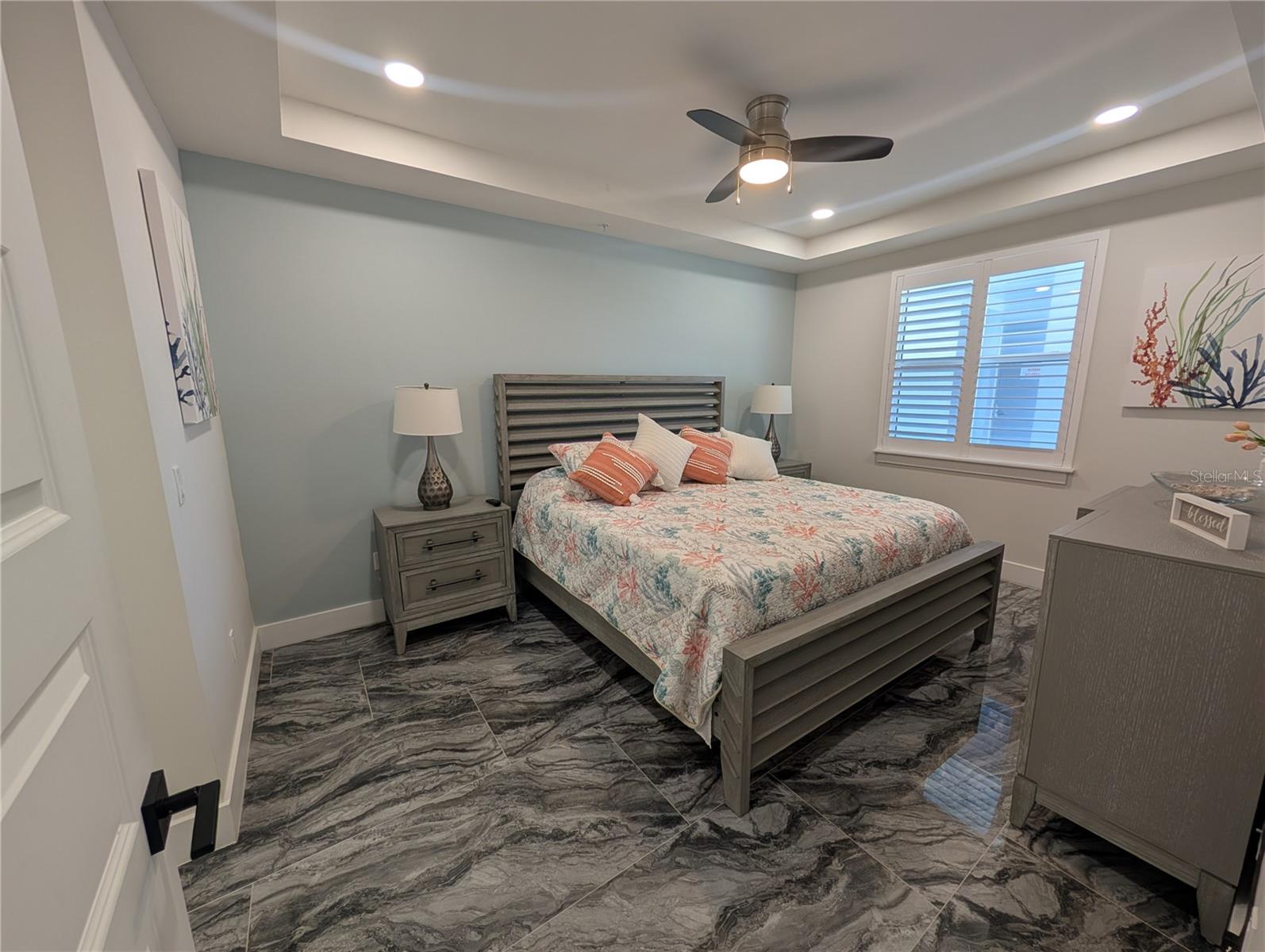 Experience breathtaking views of Charlotte Harbor from this fully furnished 2 bed 2.5 bath, move-in ready luxury condo rental located in Paradise Pointe. This spacious residence features a 174 sq. ft. covered and tiled balcony, seamlessly connected to the interior by a wall of impact-rated pocket sliders that bring the outdoors in. Inside, you’ll find elegant design details throughout, including porcelain tile flooring, solid wood doors, quartz countertops, soft-close cabinetry, and more. The open floor plan connects the kitchen, dining, and living areas, creating a perfect space for everyday living and entertaining. The kitchen is outfitted with stainless-steel appliances, a tile backsplash, and new finishes from top to bottom. Both the primary and guest bedrooms offer en-suite baths and walk-in closets, with the primary suite featuring dual vanities, a soaking tub, and a glass-enclosed tile shower. A powder room for guests, an interior laundry room, and a hallway storage closet add to the home’s functionality. Paradise Pointe offers premium amenities including a heated pool and spa, keycard-secured lobby and elevator access, tropical landscaping, an outdoor lounge with fire pit and grills, and one assigned under-building parking space. Conveniently located near Fishermen’s Village, downtown Punta Gorda, local marinas, golf courses, and regional airports, this condo offers an exceptional opportunity to enjoy the best of waterfront living in Southwest Florida.