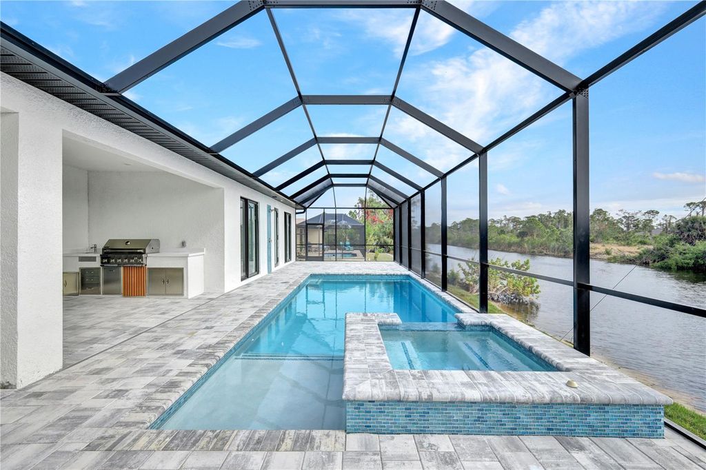 Photo of 15133 Amsterdam Avenue, Port Charlotte, FL 33981 (MLS # C7515882)