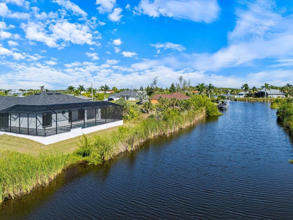 Photo of 15133 Amsterdam Avenue, Port Charlotte, FL 33981 (MLS # C7515882)