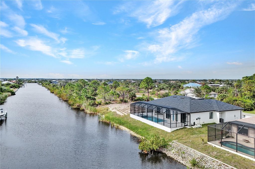Photo of 15133 Amsterdam Avenue, Port Charlotte, FL 33981 (MLS # C7515882)