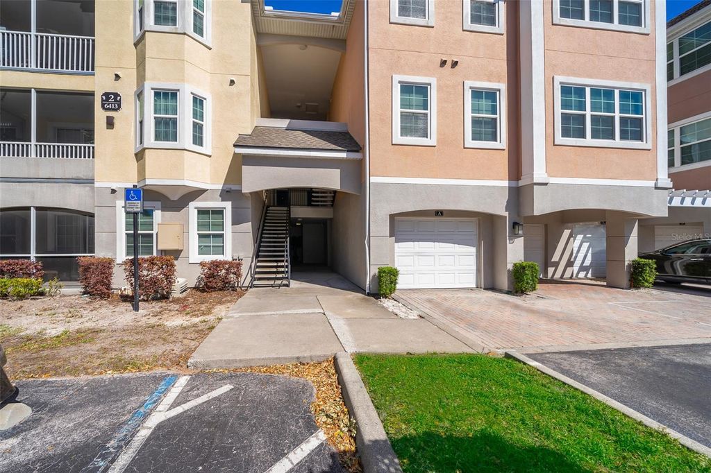 Photo of 6413 Astor Village Avenue #206, Orlando, FL 32835 (MLS # O6398104)