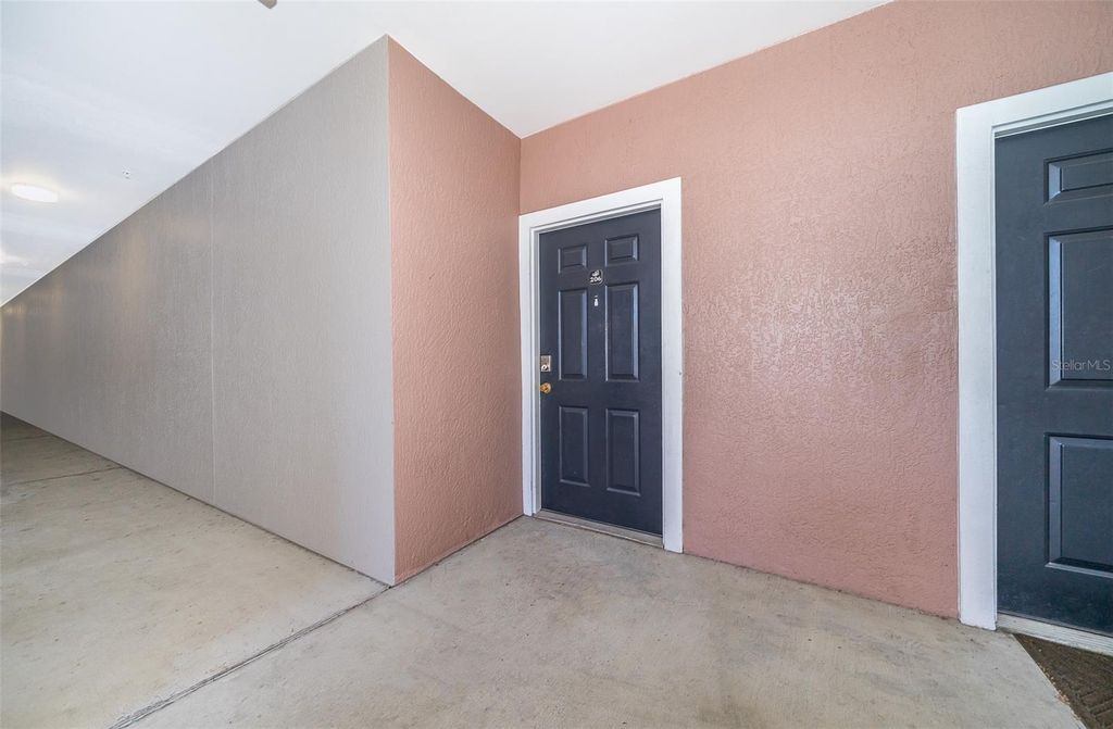 Photo of 6413 Astor Village Avenue #206, Orlando, FL 32835 (MLS # O6398104)