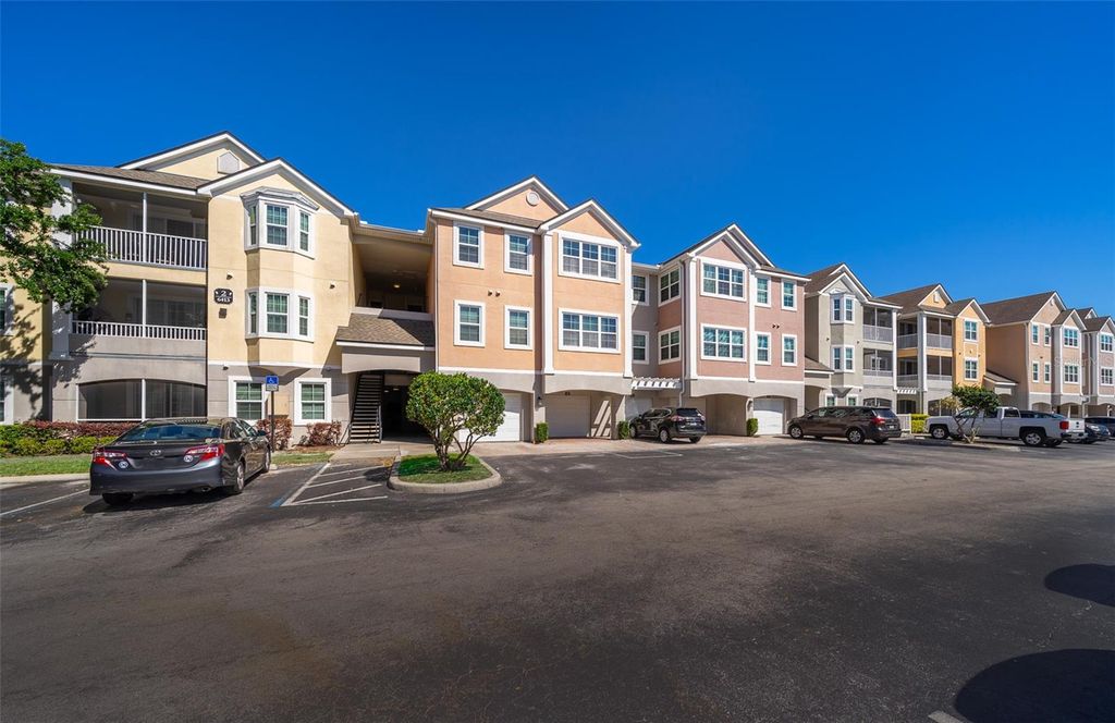 Photo of 6413 Astor Village Avenue #206, Orlando, FL 32835 (MLS # O6398104)