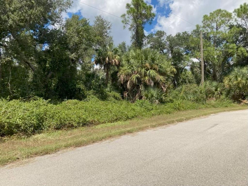 Photo of 2563 Scenic Road, North Port, FL 34288 (MLS # TB8432814)