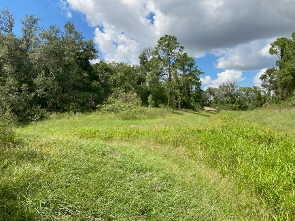 Photo of 2563 Scenic Road, North Port, FL 34288 (MLS # TB8432814)