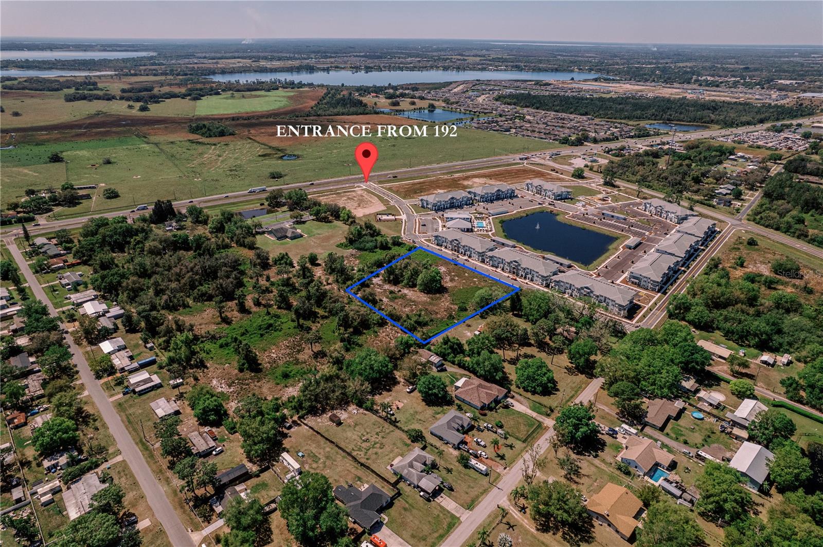 This parcel has been recently re-zoned to Community Center Perimeter (Osceola County), which allows for multiple Commercial and Multi-Family uses. 3+/- acres available, with the flexibility of less depending on Buyer's desired use. Situated perpendicular to Nova Road, & just North of US 192, the property offers easy access to St. Cloud, Melbourne and Orlando. Located within the Urban Growth Boundary, directly across from the new Marlowe Apartment complex, and frontage on Angel Way, creates access from US 192 or Lake Lizzie Drive. Entire parcel is "high & dry", abutting another available Community Center Perimeter 10+ acre parcel. This area is growing and offers great opportunity for that new business looking to open or an existing business looking to expand.
