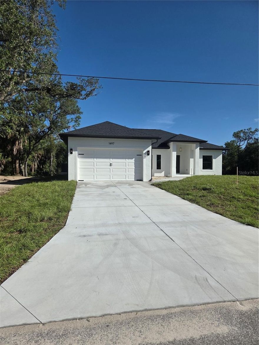 Pre-Construction Opportunity – Vacant Land with New Home Build Option- **Price reflects land only**
Don’t miss your chance to secure this oversized corner lot at 13126 Marathon Blvd, Port Charlotte—just steps from the golf course and less than a mile to the public boat ramp!

This property offers the rare opportunity to design your Florida dream home from the ground up. A proposed build includes a stylish 3 bedroom / 2 bathroom / 2-car garage block home with open floor plan, granite kitchen, luxury primary suite, and covered lanai—built with modern finishes and hurricane impact features.

Located in a growing area near beaches, parks, shopping, and dining, this lot provides the perfect balance of tranquility and convenience. No HOA. No CDD.

**Photos are from a completed model**