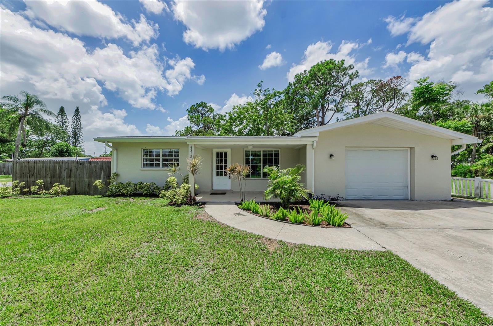 Step into this beautifully updated 3-bedroom, 2-bathroom home located on a desirable corner lot of a quiet dead-end street--just minutes from the vibrant heart of downtown New Port Richey! This move-in ready gem features stunning brand new wood-look tile flooring throughout, sleek newer stainless steel appliances in the modern kitchen, and a spacious layout perfect for comfortable living and entertaining. The primary suite boasts a massive walk-in closet, offering ample storage and a touch of everyday indulgence. With stylish finishes, added privacy, and a prime location near shopping, dining, and local attractions, this home truly has it all. With a new AC system and ductwork in 2023 and a new roof in 2019, the home is move-in ready! Call today to set up a tour! You don't want to miss this!