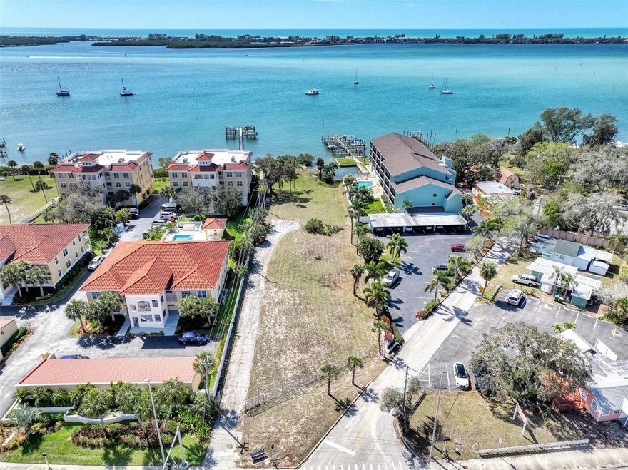 Always dreamed of living on the water and having rental income to pay the bills? Your dream just came true! This wonderful property has over 85 feet of water frontage. Enjoy your water view while sipping your morning coffee. Englewood Beach is less than 2 miles away. County zoning allows up to 8 units and the site plan engineering has been completed.  Configure the property however you want and build your dream house or condo. 

If you have even bigger plans and want to build up to 90 units, the property across the street at 201 E Bay Heights is 8.2 acres and will allow for another 82 units!  Possible seller financing.

Stop dreaming and make an offer today!