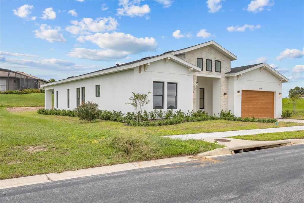 Photo of 197 Valencia Ridge Drive, Auburndale, FL 33823 (MLS # O6363114)