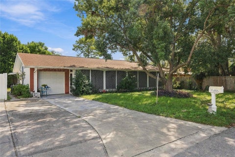 Photo of 10724 Premier Avenue, Port Richey, FL 34668 (MLS # TB8557941)
