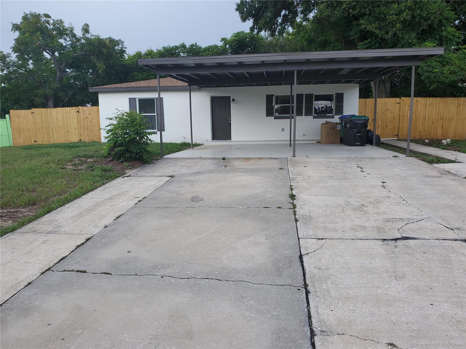 Welcome to this charming home located in Orlando. This property features spacious living areas filled with natural light, a modern kitchen with ample cabinetry, and a cozy backyard. The bedrooms are comfortably sized, and the bathrooms are tastefully updated. Outside, enjoy a private fenced in backyard appropriate for relaxation or entertaining. Conveniently located near shopping, dining, and local attractions, this home has a wonderful opportunity to experience the vibrant Orlando lifestyle. This home has been fully renovated, this home has a new roof, there is also a new hot water heater, the A/C system is brand-new, brand-new toilets, brand new kitchen cabinets and counter tops, brand new faucets in kitchen and bathrooms. Brand new wood fence. brand new sliding glass door with built in venetian blinds.