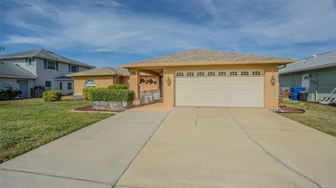 Photo of 9035 Remington Drive, New Port Richey, FL 34655 (MLS # TB8464247)