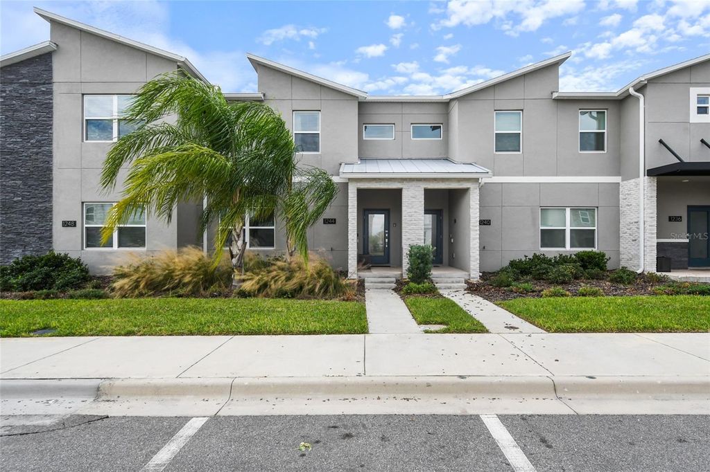Photo of 1244 Challenge Drive, Davenport, FL 33896 (MLS # O6378585)