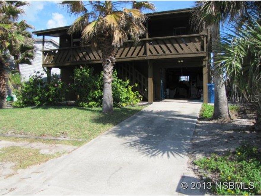 Charming little beach house on the non driving beach area, family room, one car garage. Covered balcony area on the east and west side of house along with a 15X18 tiki hut overlooking the ocean. Rock Revetment. Close to Canaveral National Seashore. ;Water: City