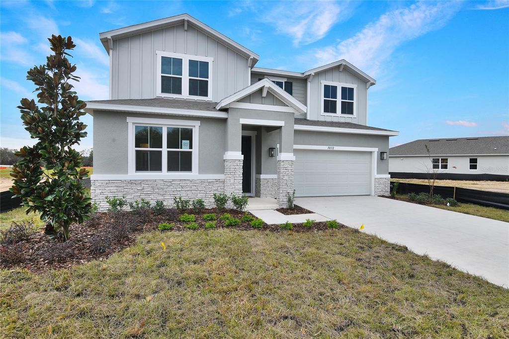 Photo of 10112 Turnberry Lane, Leesburg, FL 34788 (MLS # S5140265)