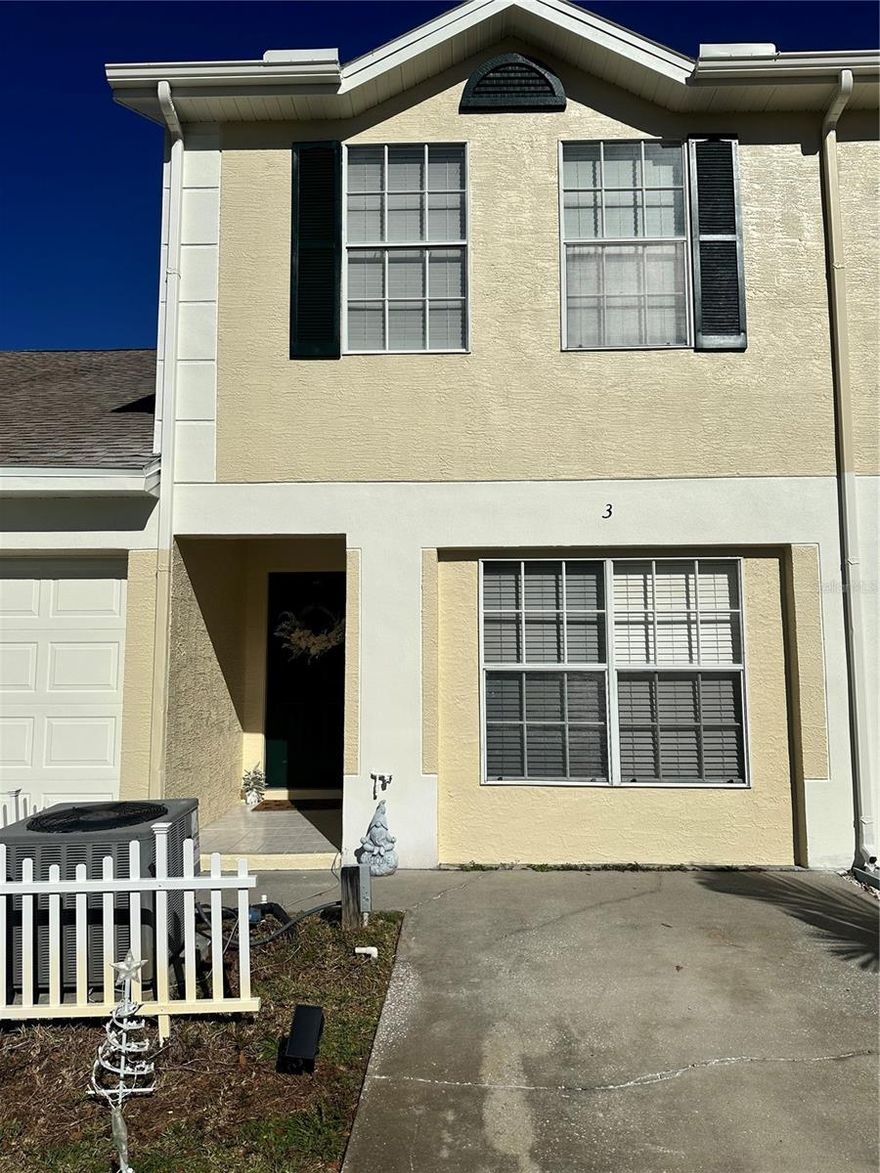 Spacious 2BR/2BA townhouse in Green Valley Estates featuring vaulted ceilings and an open-concept living, dining, and kitchen area. Private upstairs primary suite with a walk-in closet and en-suite bath. The second bedroom is located near the interior laundry. Community amenities include a pool, clubhouse with sauna, and lounge areas. Conveniently located near Honeymoon Island State Park, Dunedin shopping, Tarpon Springs Sponge Docks, and Clearwater.