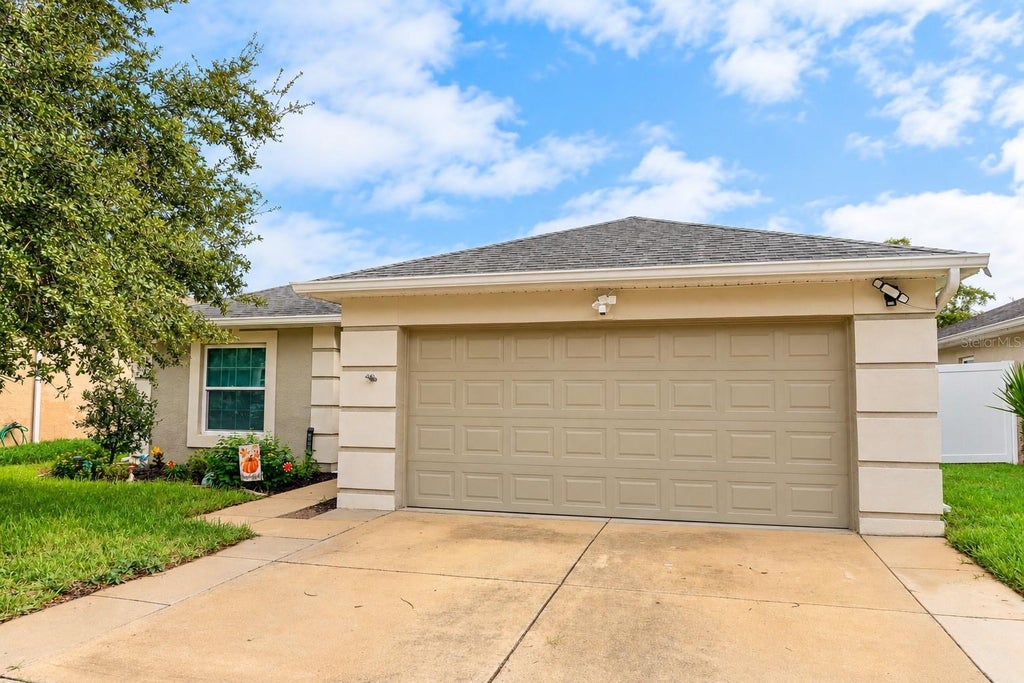 Photo of 7816 Harbor Bridge Boulevard, New Port Richey, FL 34654 (MLS # TB8555764)