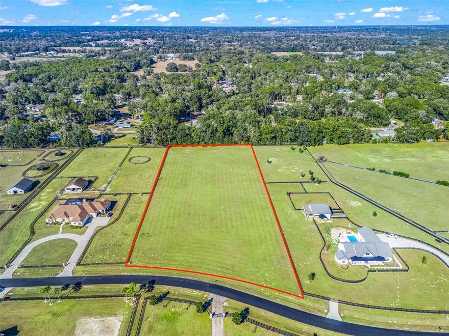 Discover this exceptional 4-acre homesite located within the exclusive, gated equestrian community of Hunterdon Hamlet. Just 5 minutes from the World Equestrian Center and 12 minutes to HITS, this prime parcel offers an unparalleled opportunity to create your dream mini-farm in one of the area’s most desirable equestrian locations.  Hunterdon Hamlet is a beautifully manicured, boutique community designed for those who appreciate the equestrian lifestyle. Two stately gated entrances provide 24-hour security and exclusivity, while the tranquil setting delivers true estate living.  Enjoy the serenity of farm life without sacrificing convenience—shopping, restaurants, gyms and  medical facilities are all just minutes away. A rare offering combining luxury, location, and lifestyle.