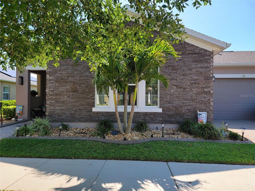 A rare find in the premier neighborhood of Trilogy in Groveland (aka Cascades of Groveland)!  Beautiful courtyard leading to beveled glass entry door opening up to a fabulous open floorplan with wood floors, crown molding, a chef's dream kitchen, custom wood cornices and window coverings, smart-space in laundry room, water purification system, 3-car garage and tons of upgrades!  And if that isn't enough, an all-weather patio with acrylic windows and electronic shade that leads to the gorgeous, screened in heated saltwater pool and spa with sun shelf and pool sweep. Between the pool light that can be set to different colors and the commercial lights around the pool, you will feel like you are in a resort.  Very private lot and beautiful landscaping complete the backyard. The community features clubhouse, pool & spa, pickle ball courts, state-of-the art gym, and best of all, a restaurant and bar onsite.  HOA includes, internet, cable, telephone, gated entry, alarm monitoring, lawn maintenance and all the wonderful amenities.