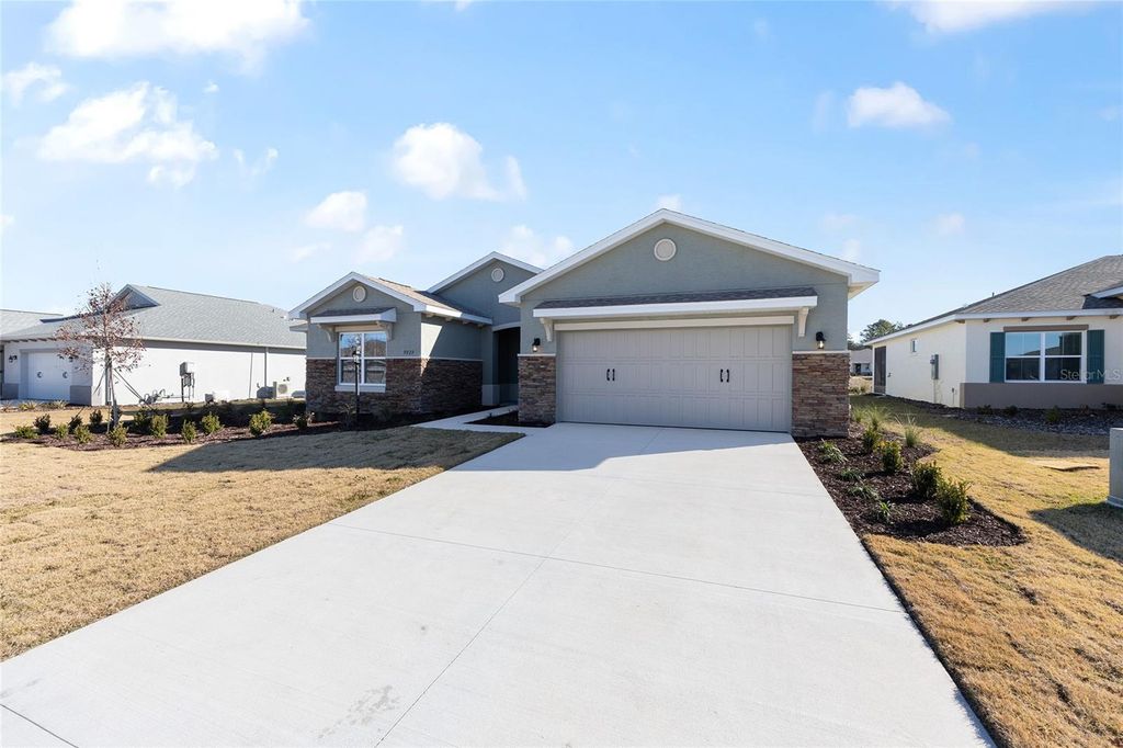 Photo of 9929 SW 106th Circle, Ocala, FL 34481 (MLS # OM718411)