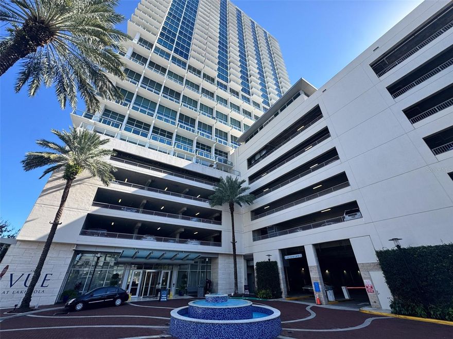 Experience elevated urban living in this stylish studio condo at The Vue at Lake Eola, one of Downtown Orlando’s premier luxury high-rises. Located on the 7th floor, this unit offers the convenience of being just steps from the building’s resort-style pool and state-of-the-art fitness center, making everyday living feel like a retreat. Step out onto your private balcony overlooking Lake Eola Park, where you can enjoy beautiful lake views and the vibrant skyline of Orlando. Floor-to-ceiling windows fill the space with natural light and showcase the energy of downtown living. Residents of The Vue enjoy luxury amenities including a 24-hour lobby guard, valet parking, secured elevators, and a stunning modern lobby, all designed to provide comfort, security, and convenience. Ideally located in the heart of downtown, you’ll be just steps from popular shops, bars, restaurants, and Publix, with everything you need within walking distance. Enjoy the best of city living with lake views, luxury amenities, and unbeatable access to Orlando’s vibrant downtown scene.