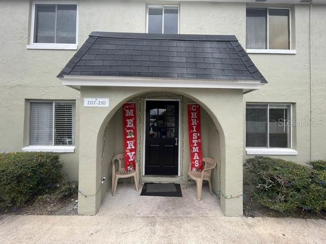 Spacious 2-bedroom, 1-bath condominium at Villas of Orlando, offering approximately 965 sq ft of living space. Features include a well-equipped kitchen, generous closet storage, and a private enclosed patio. Situated on the ground floor, the unit provides convenient access and overlooks beautifully maintained grounds. Residents enjoy three swimming pools, a tennis court, on-site laundry, free RV/boat storage, and easy access to major highways, downtown Orlando, the airport, and scenic Lake Underhill Park The HOA includes basic cable, internet, water.