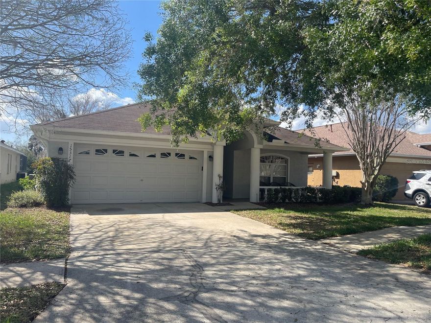 This elegantly appointed lakefront home was built by Westfield Homes and features 2112 square feet of living space with four bedrooms, two bathrooms and a two car garage. The kitchen features stainless steel appliances, granite countertops, extra tall cabinets and a lovely window bench in the dinette area. The family room is anchored by a remote controlled gas fireplace surrounded by a marble hearth and handsome built-in bookcases all overseeing exceptional views of Lake Bella. Bella Vista is conveniently located within minutes of the Veterans Expressway and Citrus Park Town Center. Stepping into the home from the covered porch, you will immediately notice the soaring ceilings throughout the entire home. The large living and dining room will welcome your guests. The master suite is stunning and has walk-in closets. The master bathroom has double sinks and a whirlpool tub with a separate shower. This split floorplan offers plenty of space with two bedrooms sharing a bathroom while the four bedroom would make an excellent office or bonus room. The family room has splendid views of the lake and so does the screened lanai. The current tenants are in the process of moving. Their personal items are still at the house. More pictures to be added later.
